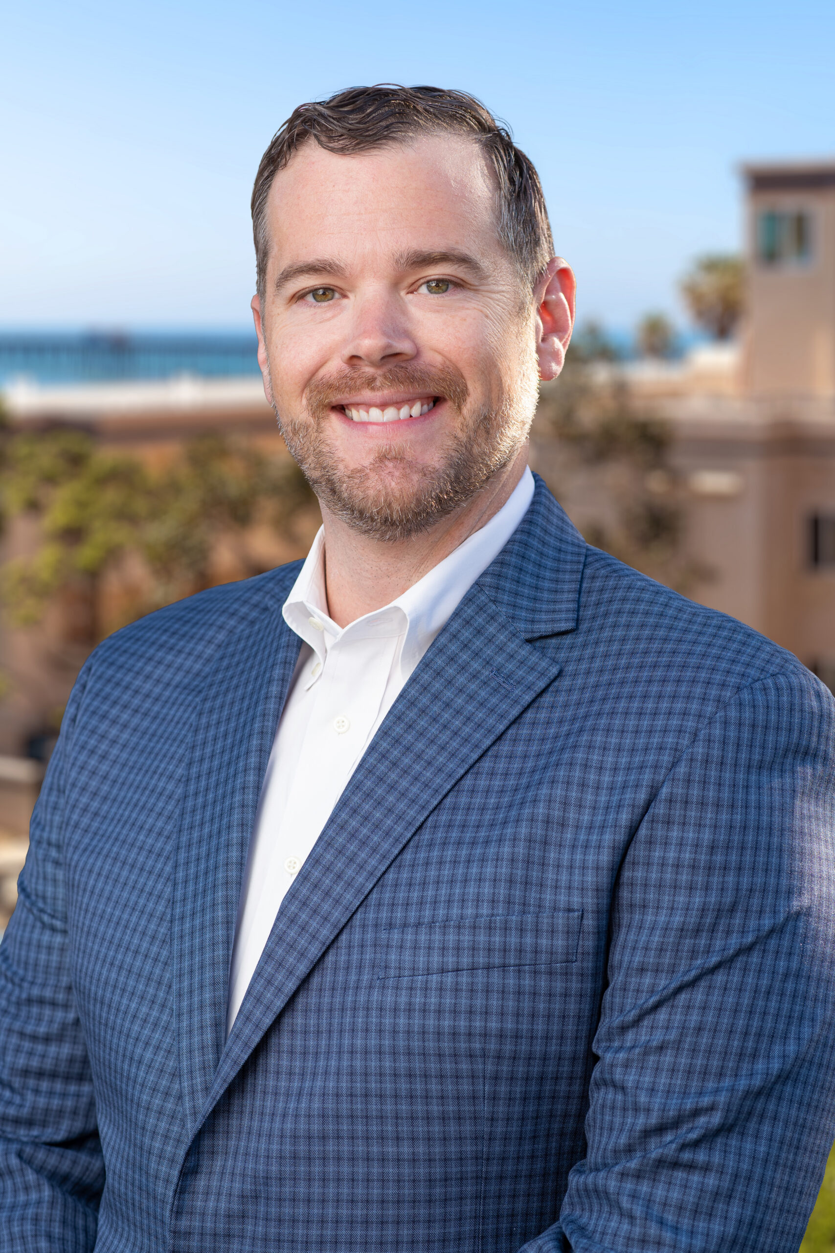 General Manager Charlie headshot in front of Southern California Beach Club
